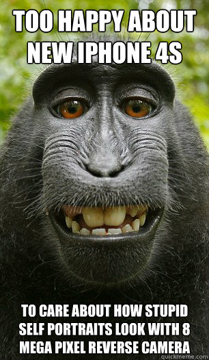 Too happy about new Iphone 4s To care about how stupid self portraits look with 8 mega pixel reverse camera  Mindful Macaque