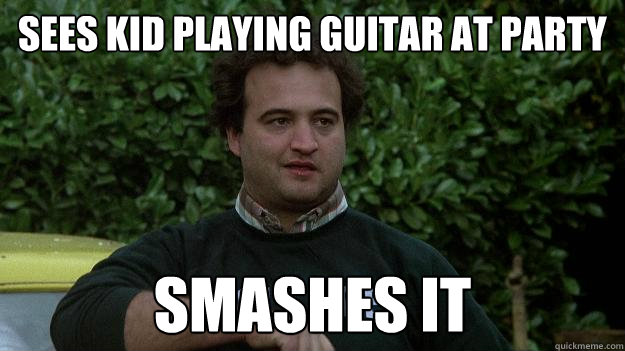 sees kid playing guitar at party smashes it  John Belushi