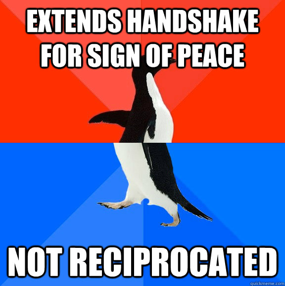 extends handshake for sign of peace not reciprocated  Socially Awesome Awkward Penguin
