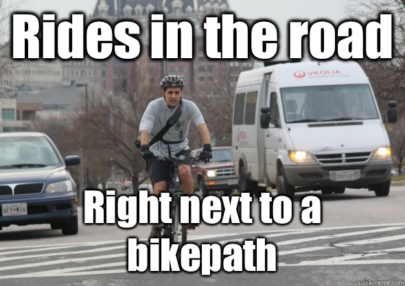 Rides in the road Right next to a bikepath - Rides in the road Right next to a bikepath  Scumbag cyclist