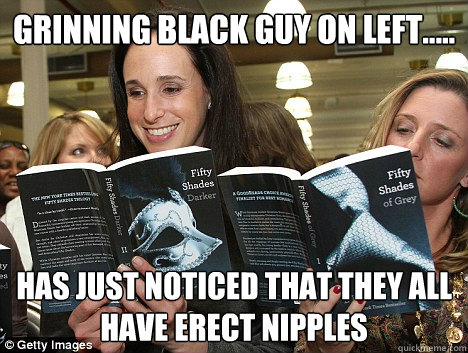 Grinning Black Guy on Left.....
 Has Just Noticed That They all Have Erect Nipples  Perverted White Woman