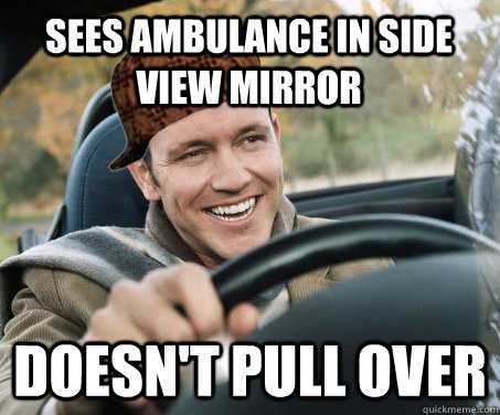 Sees ambulance in side view mirror doesn't pull over  SCUMBAG DRIVER