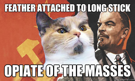 Feather attached to long stick Opiate of the masses  Vladimeow Lenin