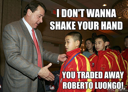 I don't wanna shake your hand You traded away Roberto Luongo!  