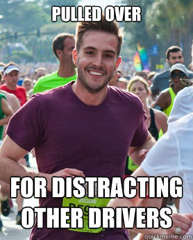 Pulled over for distracting other drivers  Ridiculously photogenic guy