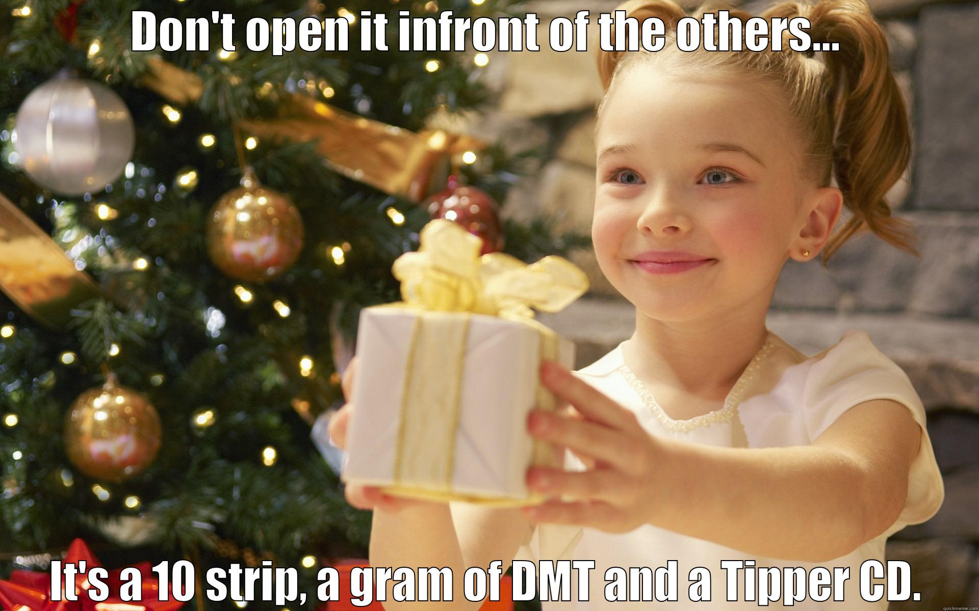 DON'T OPEN IT INFRONT OF THE OTHERS... IT'S A 10 STRIP, A GRAM OF DMT AND A TIPPER CD. Misc