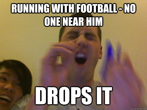 Running with Football - no one near him Drops it  