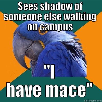 SEES SHADOW OF SOMEONE ELSE WALKING ON CAMPUS 