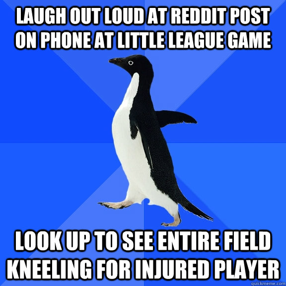 Laugh out loud at reddit post on phone at little league game Look up to see entire field kneeling for injured player  Socially Awkward Penguin
