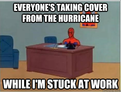everyone's taking cover from the hurricane while i'm stuck at work  Spiderman Desk