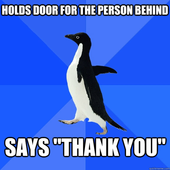 Holds door for the person behind says 