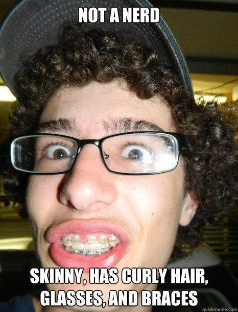 Not a nerd skinny, has curly hair, glasses, and braces  