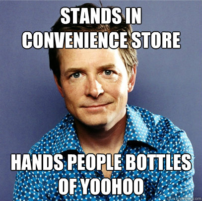 Stands in convenience store Hands people bottles of yoohoo  Awesome Michael J Fox