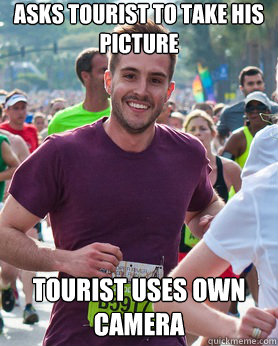 ASKS TOURIST TO TAKE HIS PICTURE TOURIST uses own camera  Ridiculously photogenic guy