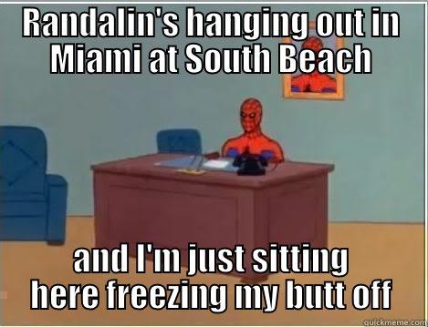 RANDALIN'S HANGING OUT IN MIAMI AT SOUTH BEACH AND I'M JUST SITTING HERE FREEZING MY BUTT OFF Spiderman Desk