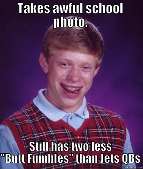 TAKES AWFUL SCHOOL PHOTO. STILL HAS TWO LESS 