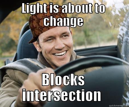 LIGHT IS ABOUT TO CHANGE BLOCKS INTERSECTION  SCUMBAG DRIVER