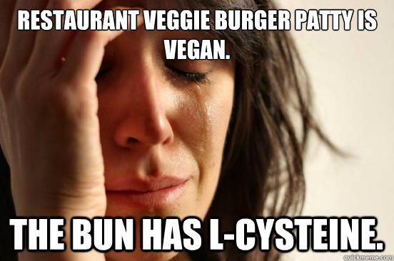 Restaurant Veggie burger patty is Vegan. The bun has l-cysteine.  First World Problems