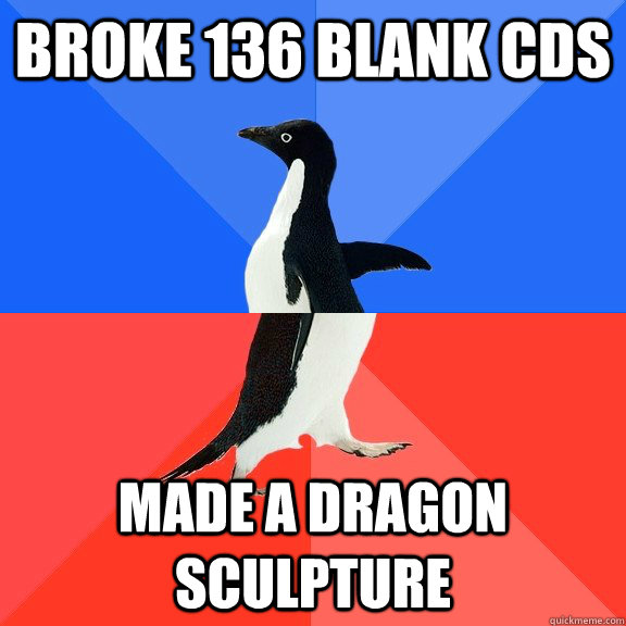broke 136 blank cds made a dragon sculpture  Socially Awkward Awesome Penguin