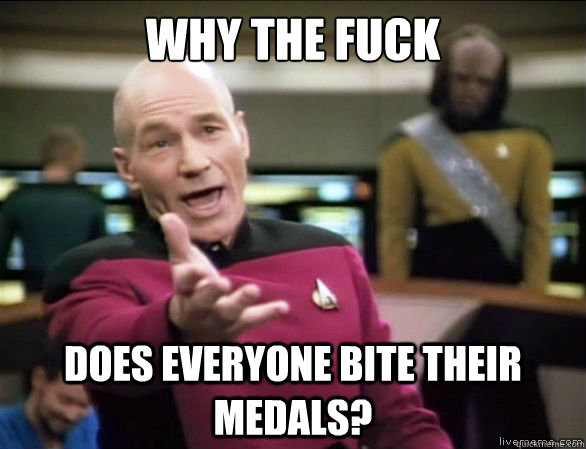 why the fuck does everyone bite their medals?  Annoyed Picard HD