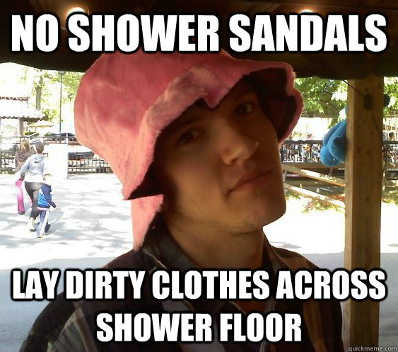 NO SHOWER SANDALS LAY DIRTY CLOTHES ACROSS SHOWER FLOOR   