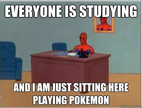Everyone is studying and I am just sitting here playing pokemon  Spiderman Desk