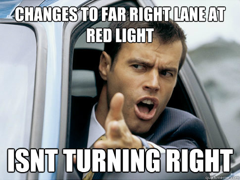 Changes to far right lane at red light isnt turning right  Asshole driver