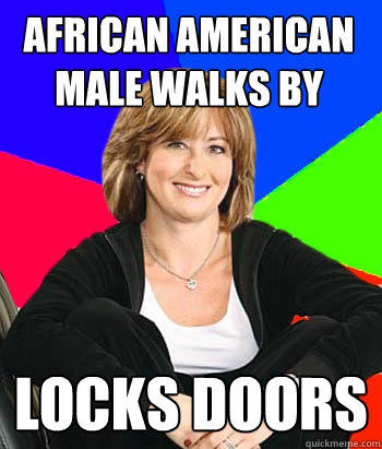 African american male walks by locks doors  