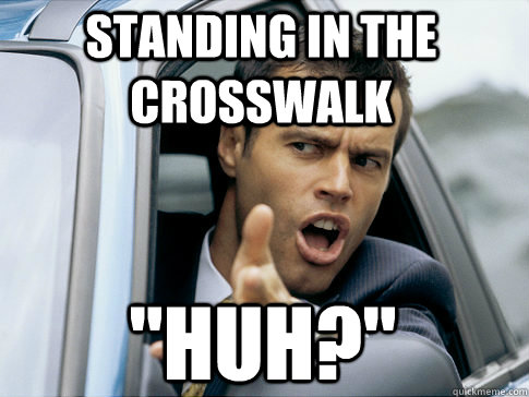 standing in the crosswalk 