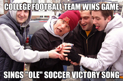 College football team wins game Sings 