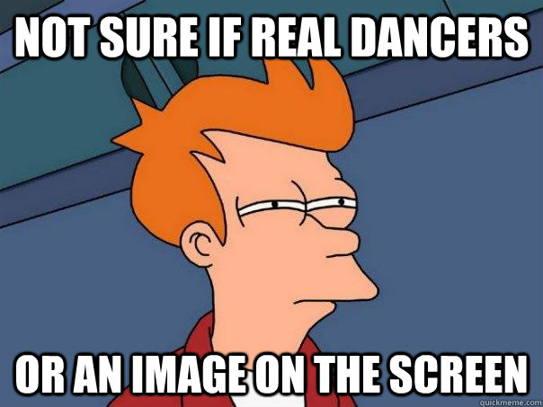 Not sure if real dancers or an image on the screen  Futurama Fry