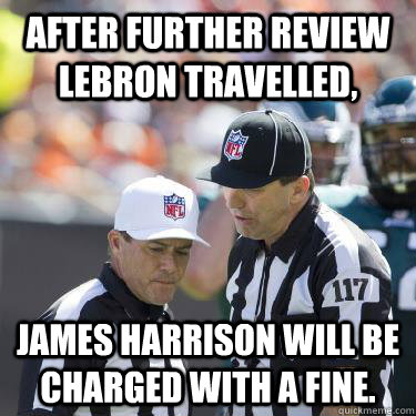 After further review lebron travelled, James Harrison will be charged with a fine.  Replacement Refs