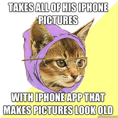 Takes all of his iphone pictures  with iphone app that makes pictures look old  Hipster Kitty