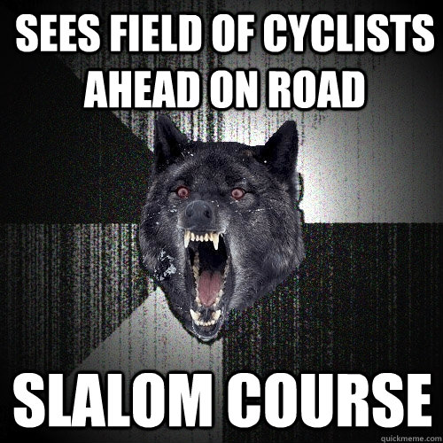 Sees field of cyclists ahead on road slalom course  Insanity Wolf
