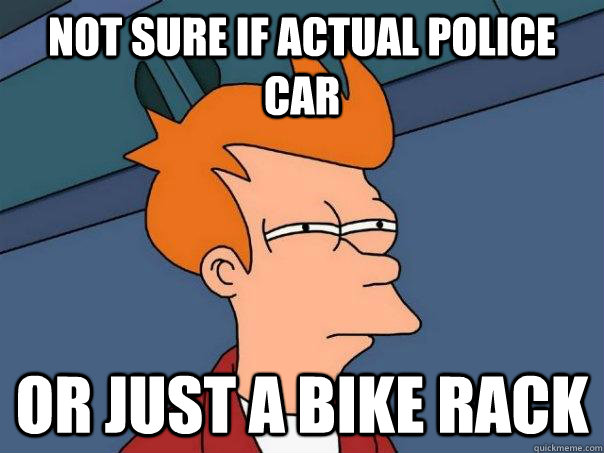Not sure if actual police car Or just a bike rack - Not sure if actual police car Or just a bike rack  Futurama Fry