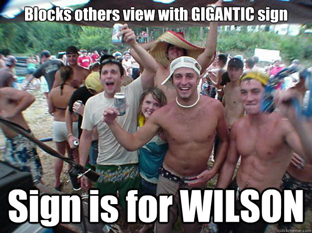 Blocks others view with GIGANTIC sign Sign is for WILSON  Show Bro