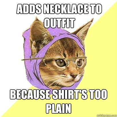 adds necklace to outfit because shirt's too plain  