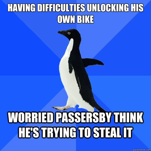 Having difficulties unlocking his own bike worried passersby think he's trying to steal it  Socially Awkward Penguin