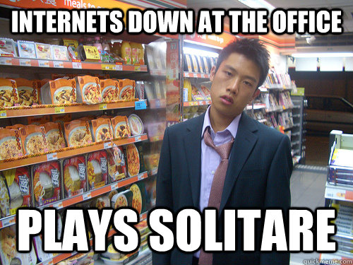 Internets down at the office plays solitare  Disenchanted Young Professional