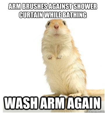 arm brushes against shower curtain while bathing wash arm again  