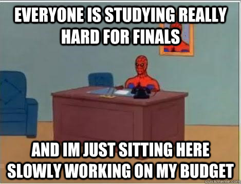 Everyone is studying really hard for finals and im just sitting here slowly working on my budget  Spiderman Desk