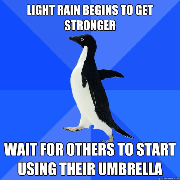 Light rain begins to get stronger wait for others to start using their umbrella  Socially Awkward Penguin