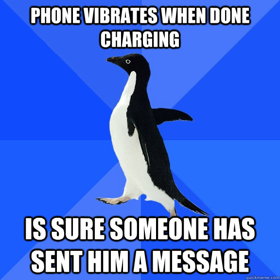 Phone vibrates when done charging is sure someone has sent him a message  Socially Awkward Penguin