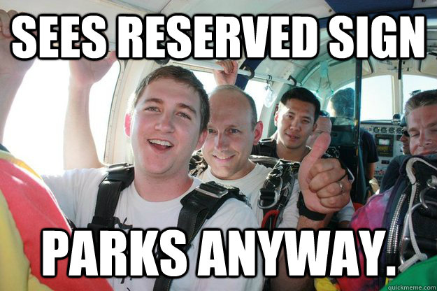 Sees reserved sign Parks anyway.  