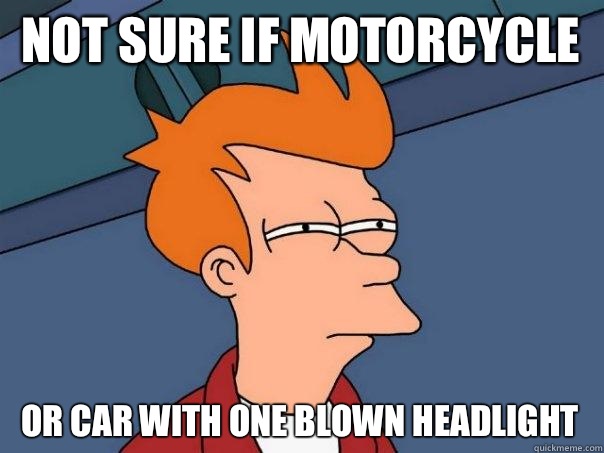 Not sure if motorcycle Or car with one blown headlight  Futurama Fry
