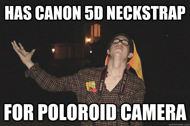 Has canon 5d neckstrap for poloroid camera  