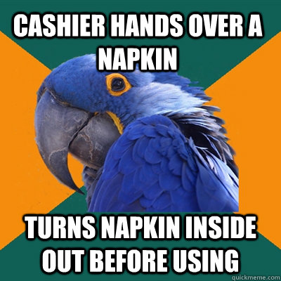 cashier hands over a napkin turns napkin inside out before using  Paranoid Parrot