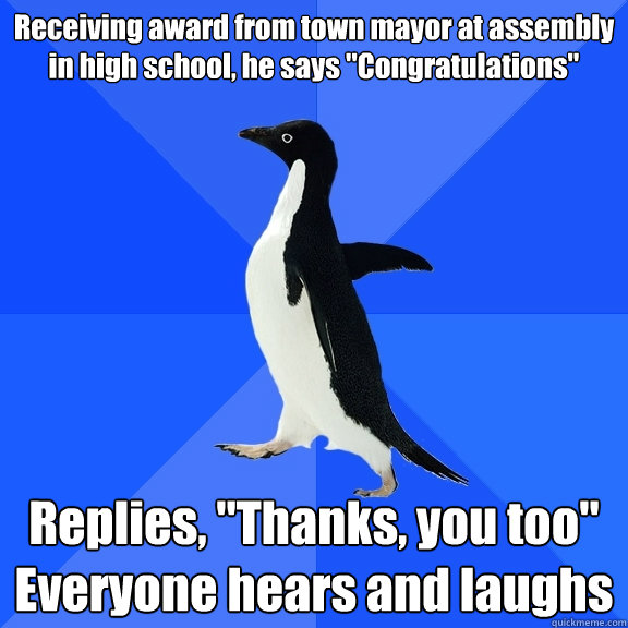 Receiving award from town mayor at assembly in high school, he says 