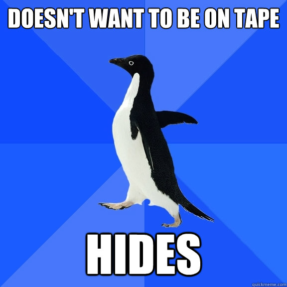 doesn't want to be on tape hides  Socially Awkward Penguin