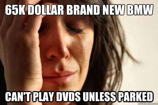 65k dollar brand new bmw can't play dvds unless parked  First World Problems